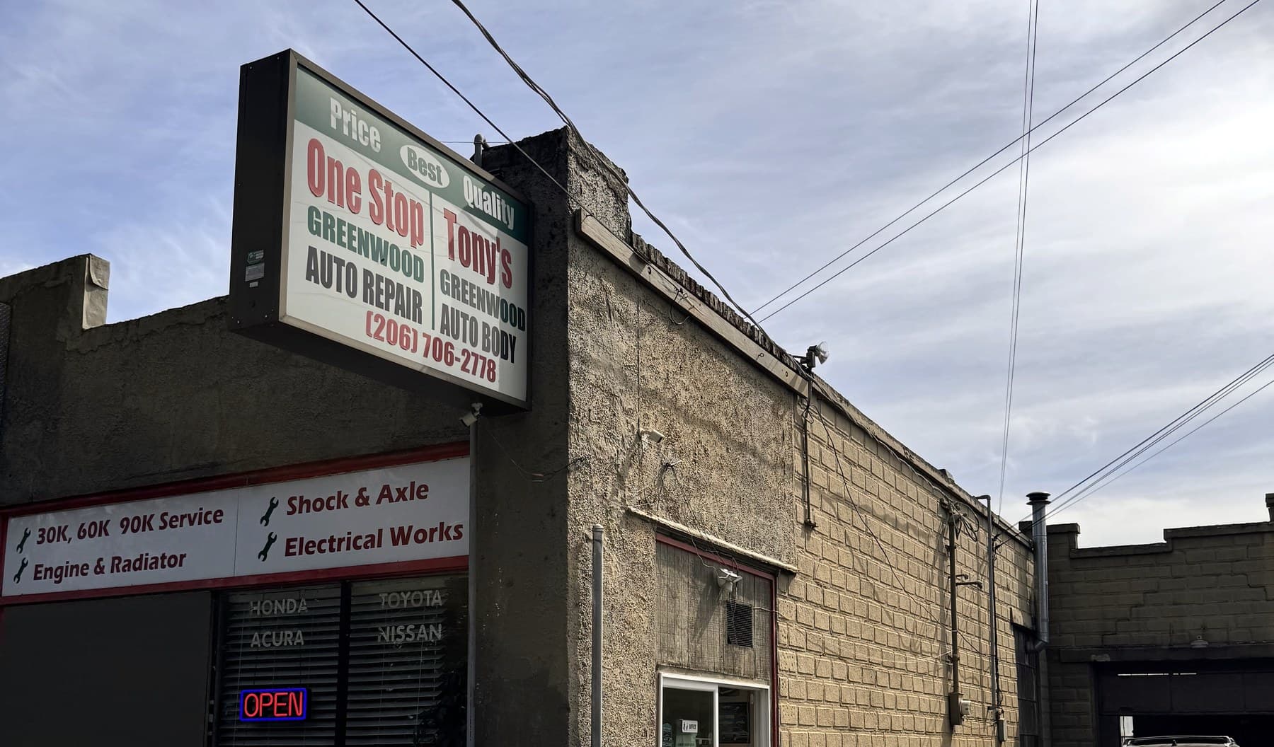 Tony's Greenwood Auto Body storefront on Greenwood Ave with OPEN sign visible